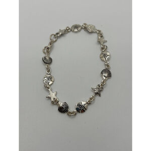 Women's Silver Tone Seashell & Starfish Charm Bracelet